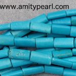 6569 howlite stone dyed turquoise color about 8mm x 15-17mm.jpg